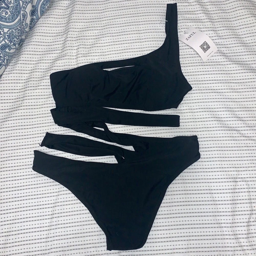BRAND NEW Criss cross one piece